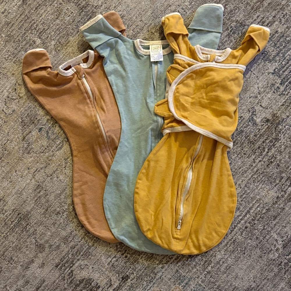 Swaddle Design Set of Three Baby Swaddle Sacks in Brown, Blue, and Yellow